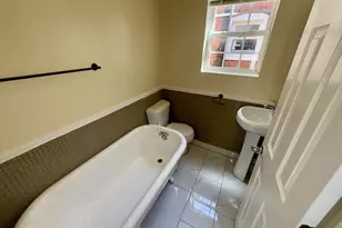 402 E 28th Street E, Baltimore, MD 21218 - Photo 11