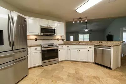 9687 Parker Lake Circle, Navarre, FL 32566 - Photo 11