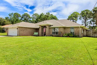7535 Brewster Street, Navarre, FL 32566 - Photo 1