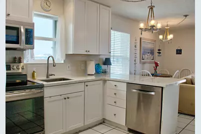 7464 Sunset Harbor Drive #APT 131, Navarre, FL 32566 - Photo 11