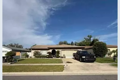 1644 E Grovehill Road, Palm Harbor, FL 34683 - Photo 1