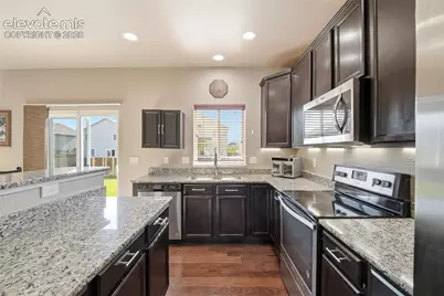 6104 Fiddle Way, Colorado Springs, CO 80925 - Photo 11