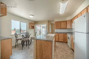 7119 Lone Eagle Ln, Colorado Springs, CO 80925 - Photo 11