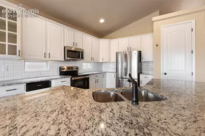7492 Bigtooth Maple Drive, Colorado Springs, CO 80925 - Photo 11