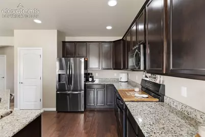10013 Thunderbolt Trail, Colorado Springs, CO 80925 - Photo 9