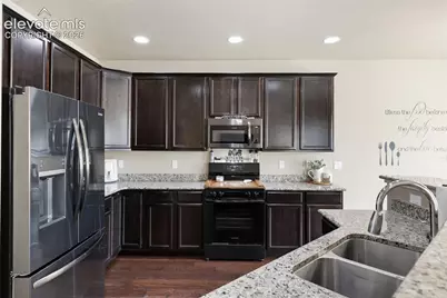 10013 Thunderbolt Trail, Colorado Springs, CO 80925 - Photo 7