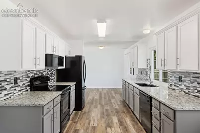 3240 Blue Mountain Way, Colorado Springs, CO 80906 - Photo 7
