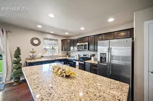 10061 Thunderbolt Trail, Colorado Springs, CO 80925 - Photo 11