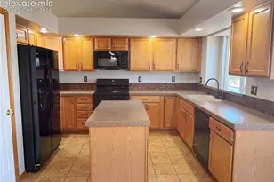7042 Grand Prairie Dr, Colorado Springs, CO 80923 - Photo 9