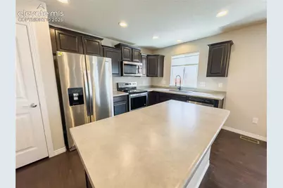 10881 Aliso Drive, Colorado Springs, CO 80925 - Photo 7