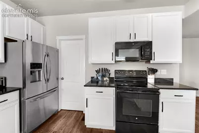 7437 Bigtooth Maple Drive, Colorado Springs, CO 80925 - Photo 13