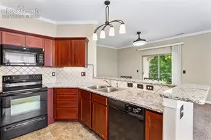 1695 Little Bear Creek Point, Colorado Springs, CO 80904 - Photo 11