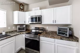 9766 Desert Lily Cir, Colorado Springs, CO 80925 - Photo 15