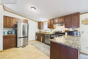 1047 S Saddlerock Dr, Pueblo West, CO 81007 - Photo 19