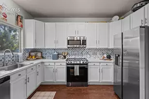 9327 Pony Gulch Way, Colorado Springs, CO 80925 - Photo 13