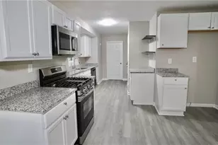 5521 E Wind Dr SW, Lilburn, GA 30047 - Photo 13