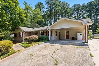 824 Hickory Ridge Road SW, Lilburn, GA 30047 - Photo 1