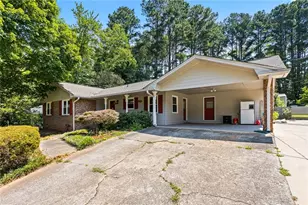 824 Hickory Ridge Rd SW, Lilburn, GA 30047 - Photo 1