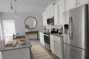 7437 Knoll Hollow Rd, Lithonia, GA 30058 - Photo 7