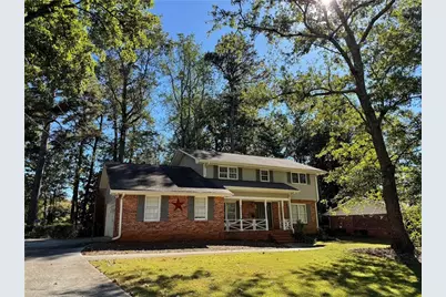 5781 Four Winds Drive SW, Lilburn, GA 30047 - Photo 1