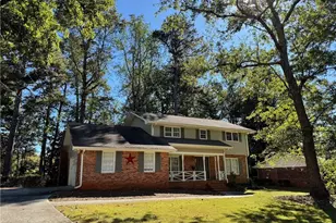 5781 Four Winds Dr SW, Lilburn, GA 30047 - Photo 1