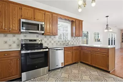 1660 Calvin Davis Circle, Lawrenceville, GA 30043 - Photo 13