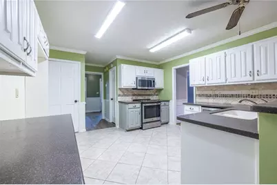 1880 Meadowchase Court, Snellville, GA 30078 - Photo 21