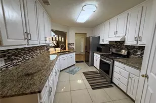 4080 Landress Park Dr NW, Lilburn, GA 30047 - Photo 9