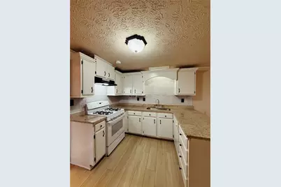 815 Sunfield Drive NW, Lilburn, GA 30047 - Photo 7