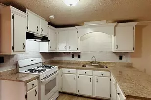 815 Sunfield Dr NW, Lilburn, GA 30047 - Photo 7