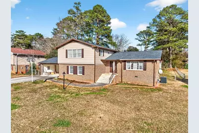 5657 Bob White Circle NW, Lilburn, GA 30047 - Photo 1
