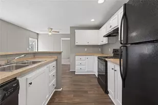 5458 Rolling Oak Ln, Buford, GA 30518 - Photo 7