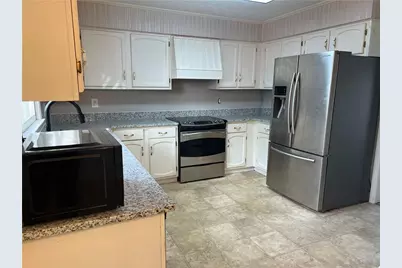 1725 Spindle Top Court SW, Lilburn, GA 30047 - Photo 9