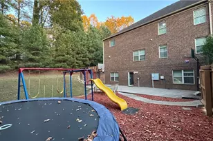 180 Village Green Ct SW, Lilburn, GA 30047 - Photo 17