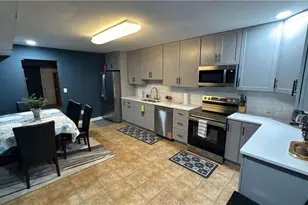 180 Village Green Ct SW, Lilburn, GA 30047 - Photo 13