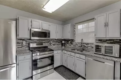 5160 Arrowind Road NW, Lilburn, GA 30047 - Photo 5