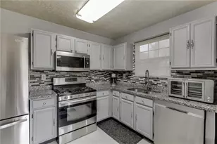 5160 Arrowind Rd NW, Lilburn, GA 30047 - Photo 5