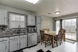 5160 Arrowind Rd NW, Lilburn, GA 30047 - Photo 7