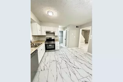 337 Bradley Woods Court NW, Lilburn, GA 30047 - Photo 7