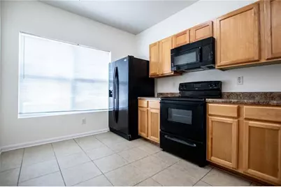 2326 Bigwood Trail, Atlanta, GA 30349 - Photo 9