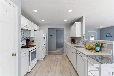 8425 River Hill Commons Drive, Ball Ground, GA 30107 - Photo 11