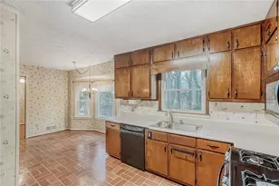 2032 Lake Lucerne Dr SW, Lilburn, GA 30047 - Photo 13