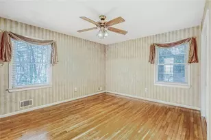 2032 Lake Lucerne Dr SW, Lilburn, GA 30047 - Photo 17