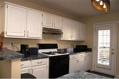 5718 Hidden Brook Circle, Atlanta, GA 30349 - Photo 5