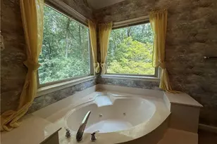 4651 Deep Creek Dr NE, Sugar Hill, GA 30518 - Photo 35