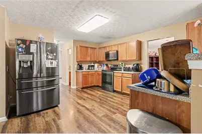 5759 Shoals Place Trail, Atlanta, GA 30349 - Photo 9