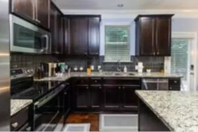 1547 Paxton Drive SW, Lilburn, GA 30047 - Photo 13