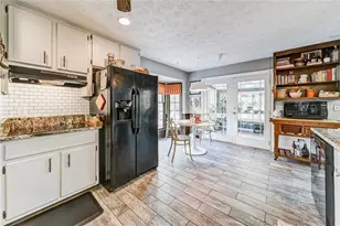 4587 Town Crier Rd SW, Lilburn, GA 30047 - Photo 13