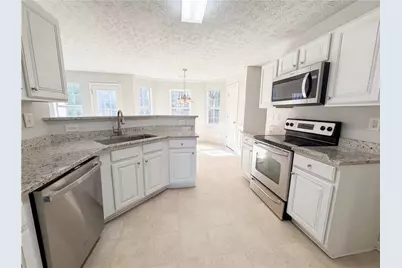 6497 Snowden Drive, Atlanta, GA 30349 - Photo 9