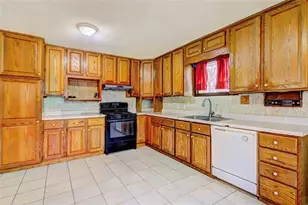 562 Dickens Rd NW, Lilburn, GA 30047 - Photo 9